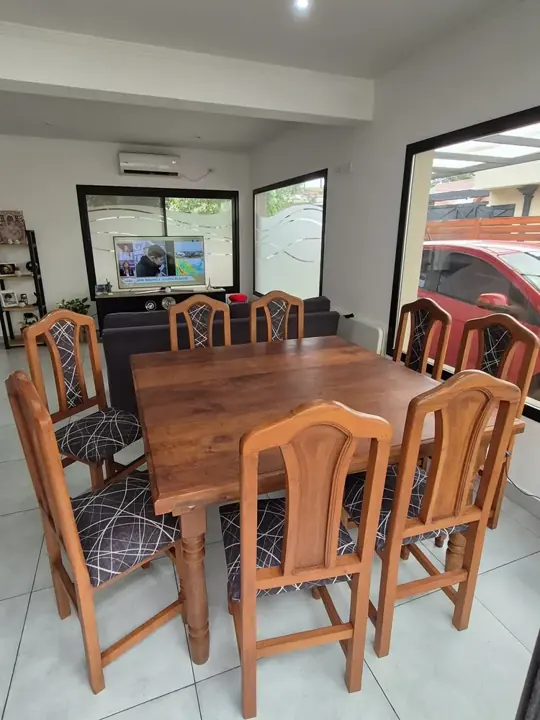 Foto de comprador de Comedor de Algarrobo para 8 Personas con Sillas Tapizadas 1
